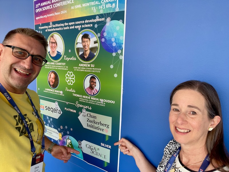 Scott Hunter and Nomi Harris point to BOSC 2024 poster