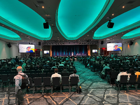 Audience and stage at the opening session of ISMB 2026